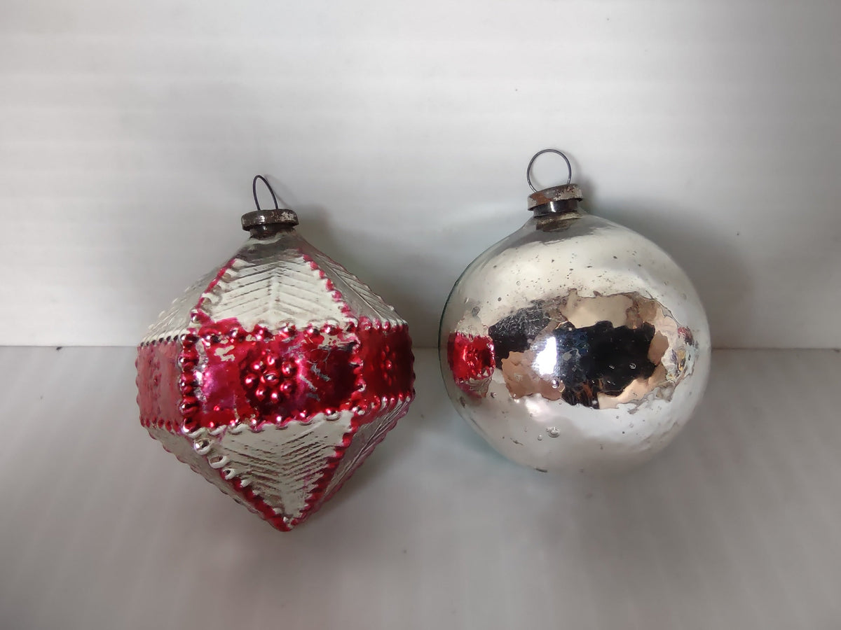 Vintage Christmas ornaments with ruler showing approximately 2 inch size