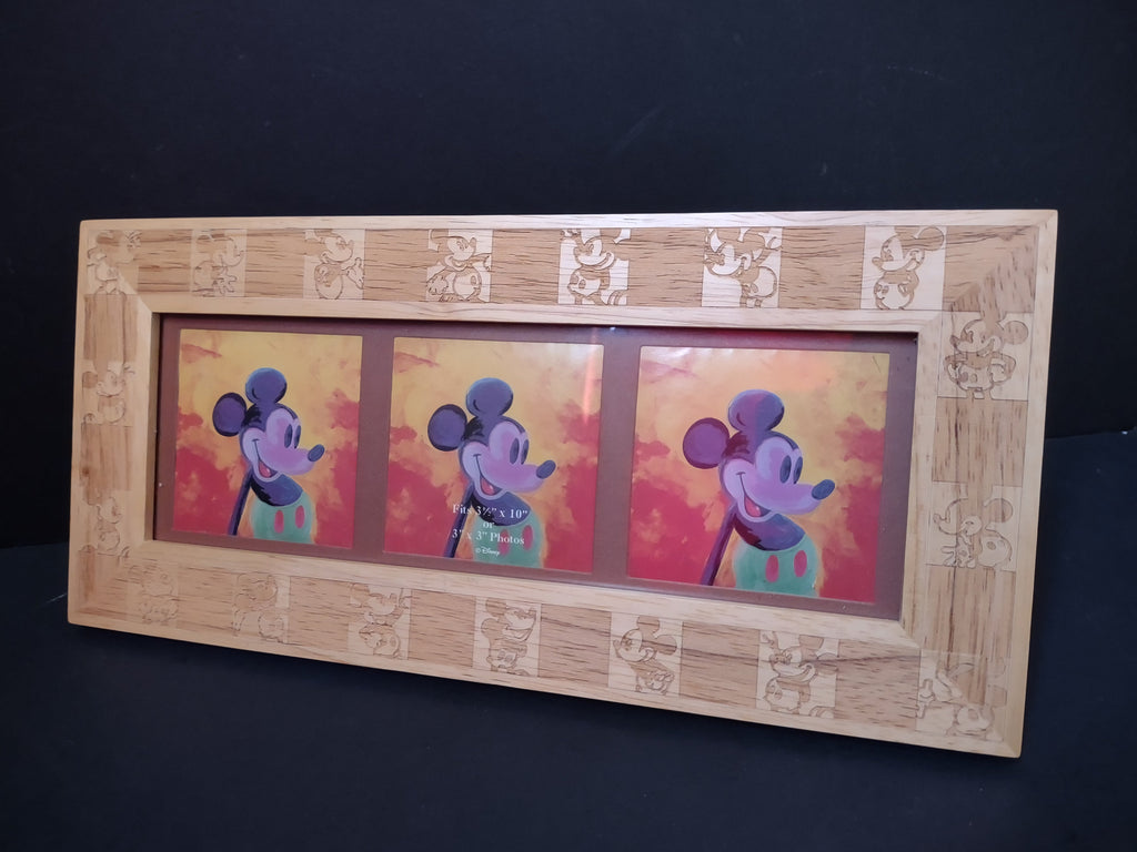 Back of Disney wood triple photo frame showing Made in Thailand Disney label and easel stand