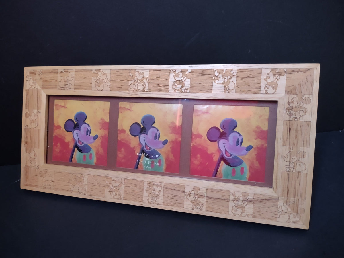Back of Disney wood triple photo frame showing Made in Thailand Disney label and easel stand