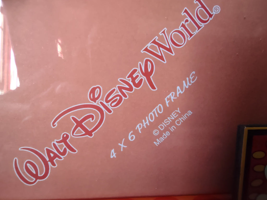 Front of Vintage Walt Disney World Mickey Mouse red 4x6 photo frame with 3D Mickey logo and accent tile