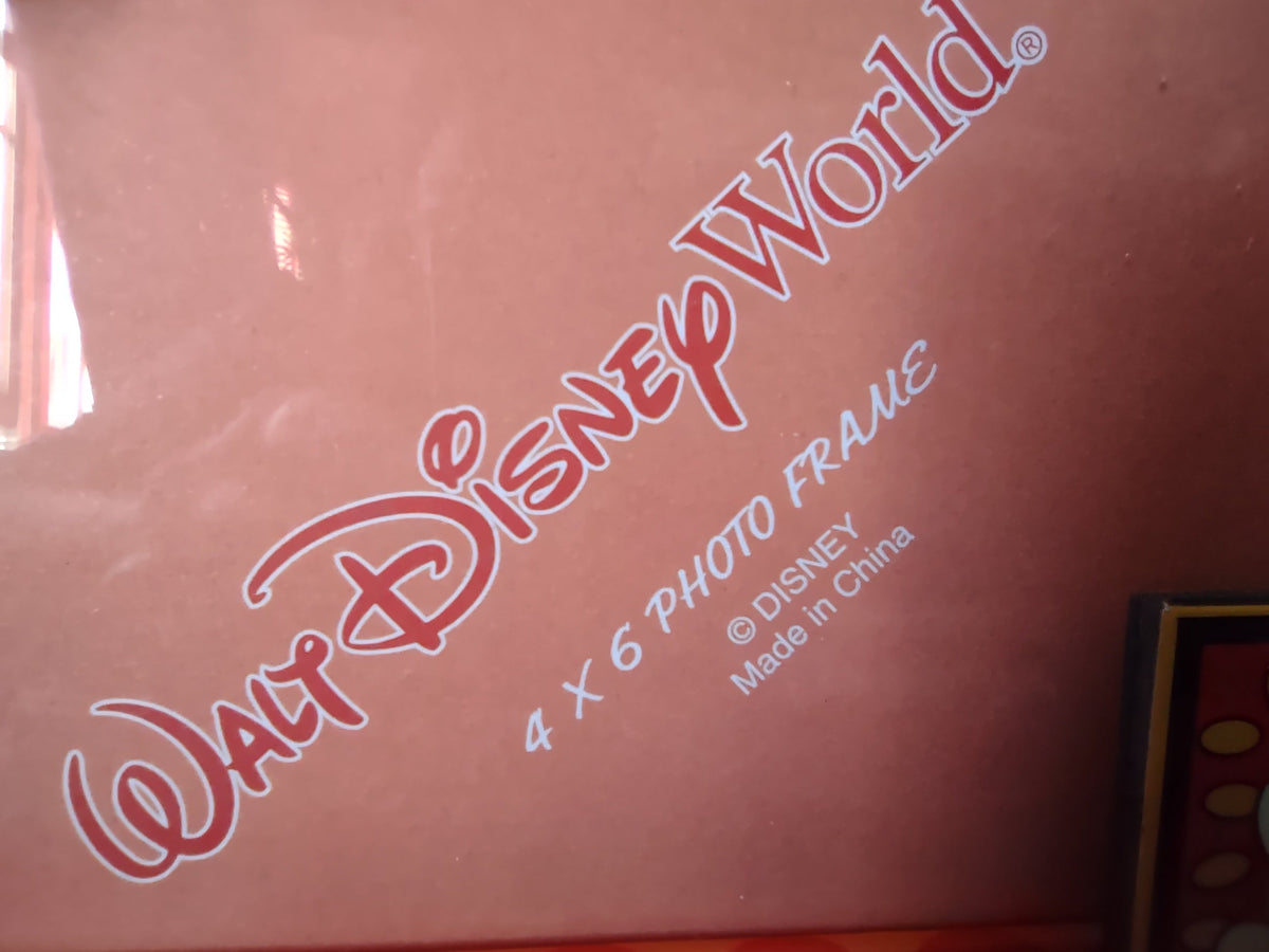 Front of Vintage Walt Disney World Mickey Mouse red 4x6 photo frame with 3D Mickey logo and accent tile