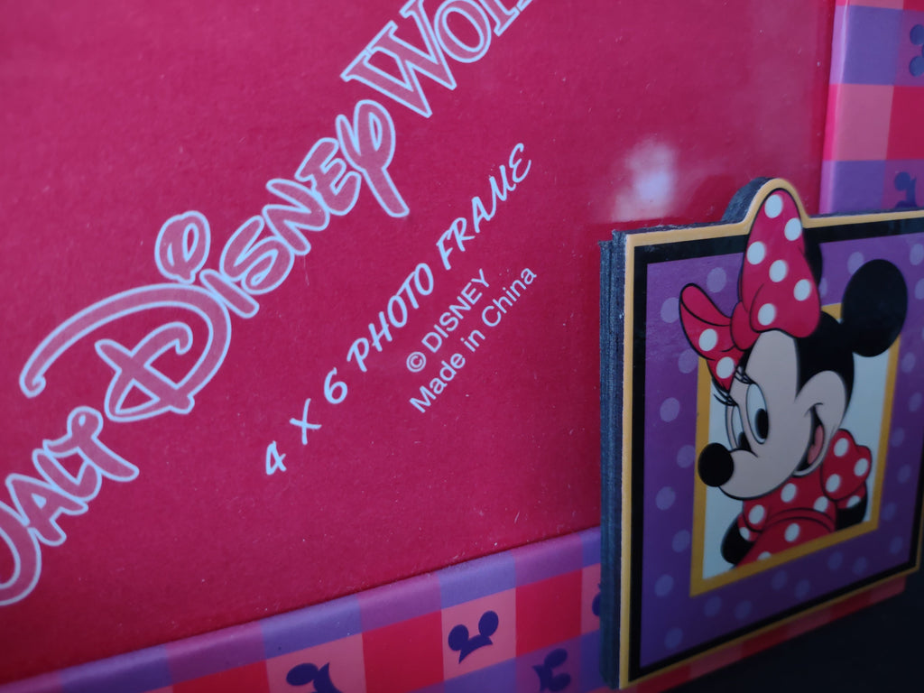 Front of Vintage Walt Disney World Minnie Mouse pink purple 4x6 photo frame with 3D Minnie logo topper and portrait accent tile