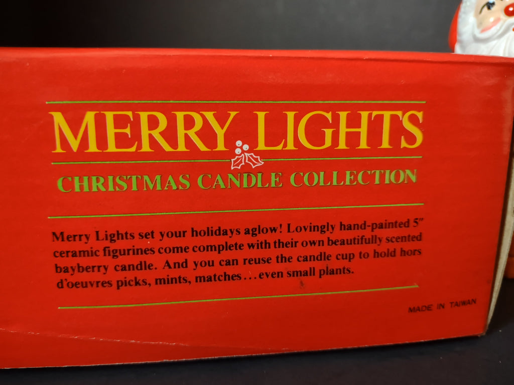 Close-up of Merry Lights Christmas Candle Collection box describing hand-painted 5 inch ceramic figurines with bayberry candle