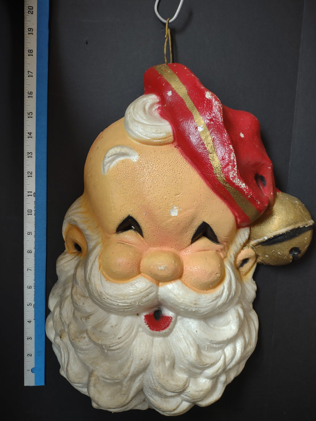 Vintage Santa face wall hanging with ruler showing 14 inch height