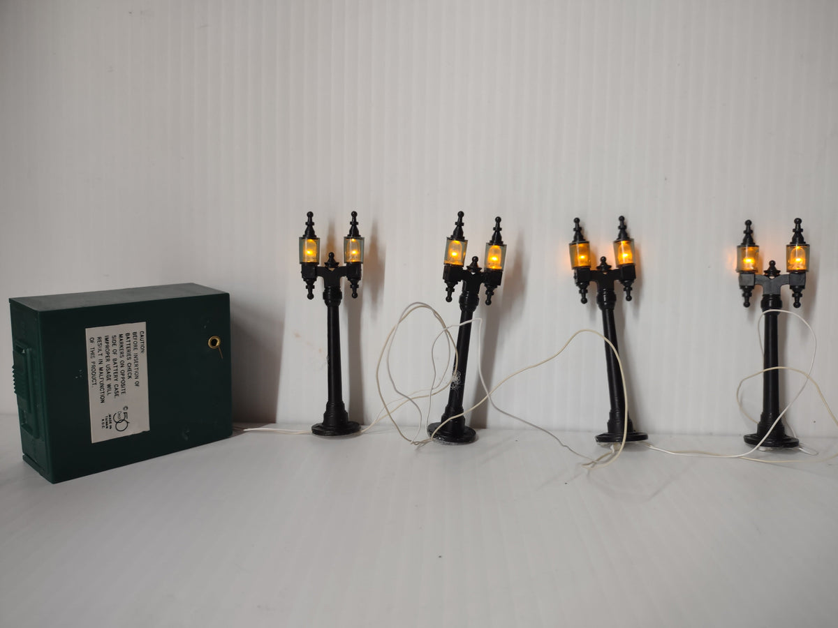 Set of 4 double arm lamp posts lit with green control box
