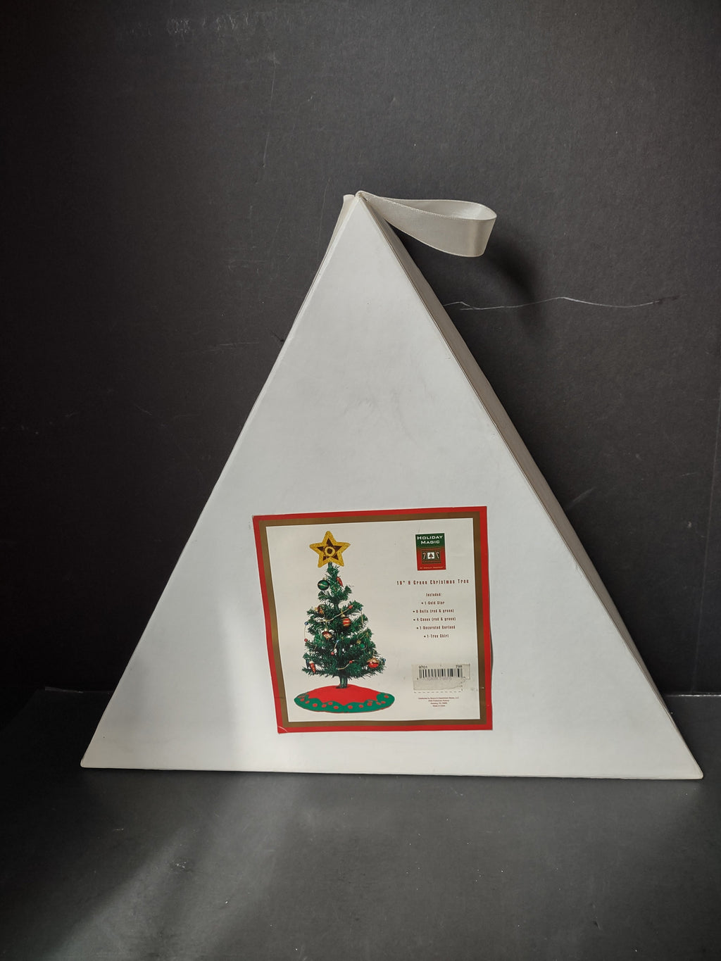 Holiday Magic Christmas tree with ruler showing approximately 19 inch height, with accessories