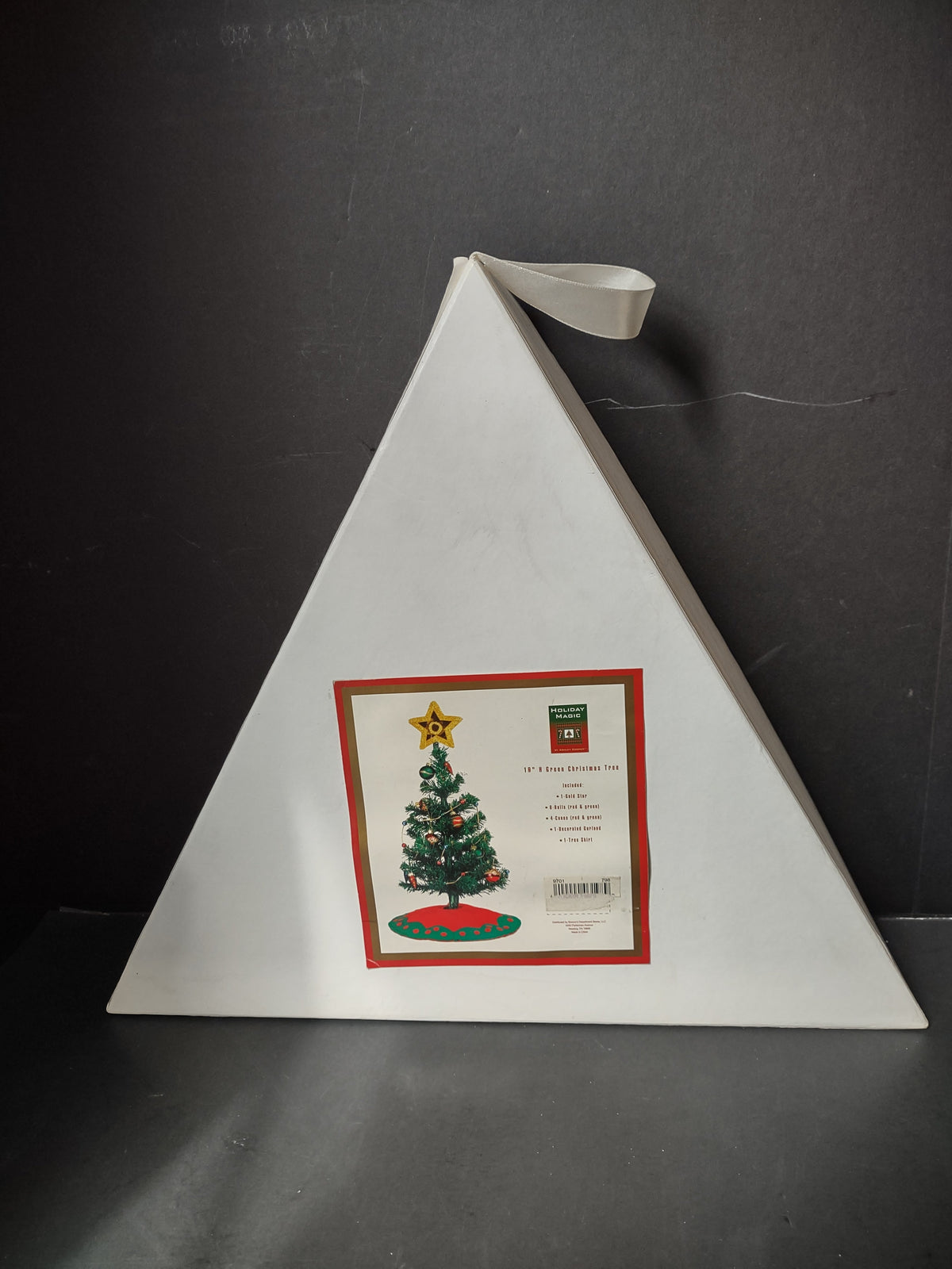 Holiday Magic Christmas tree with ruler showing approximately 19 inch height, with accessories