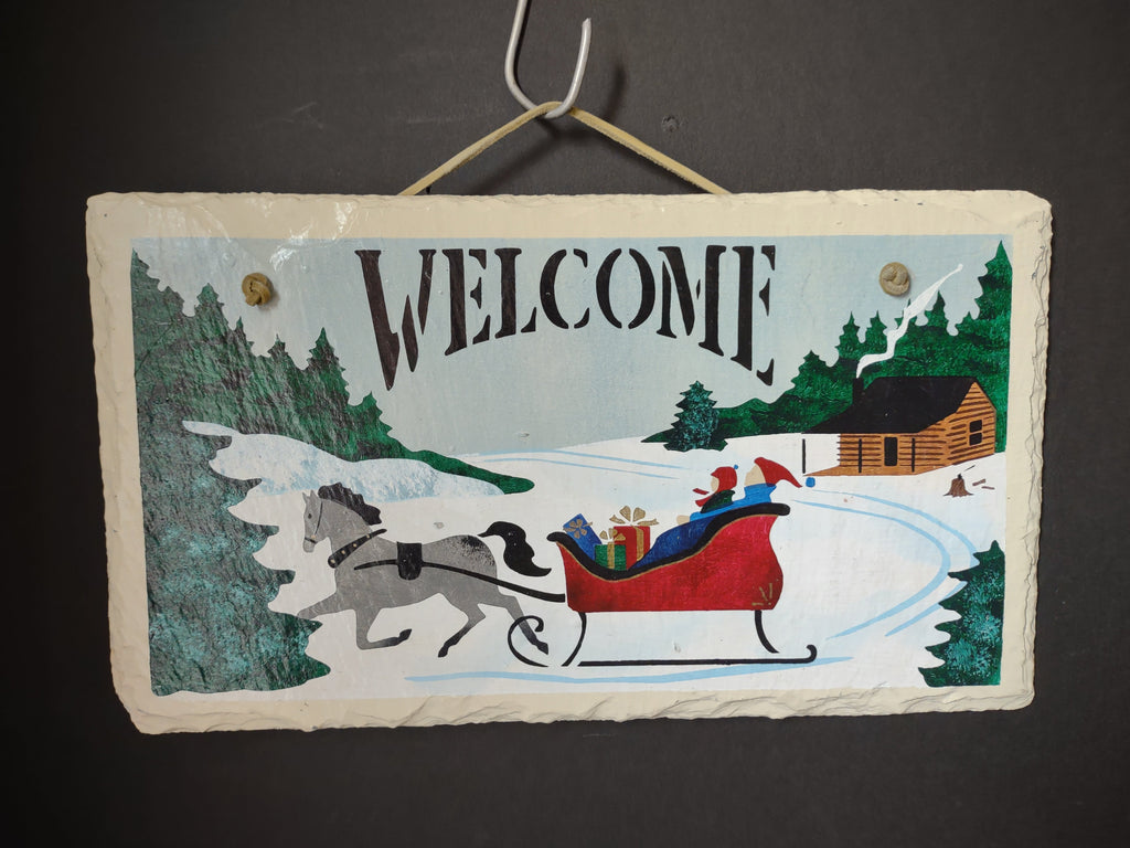 Side view of slate welcome sign showing approximately 6 inch height with ruler