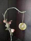 Vintage gold wire mesh ball ornament with ruler for scale