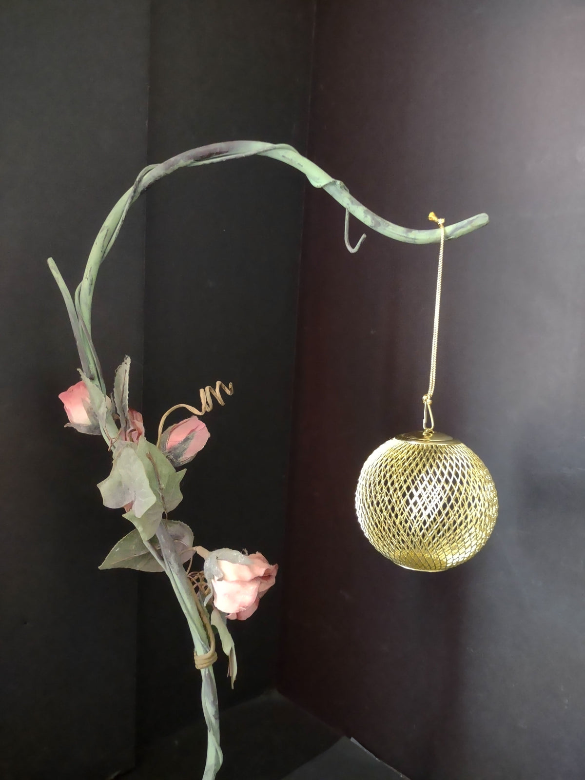 Vintage gold wire mesh ball ornament with ruler for scale
