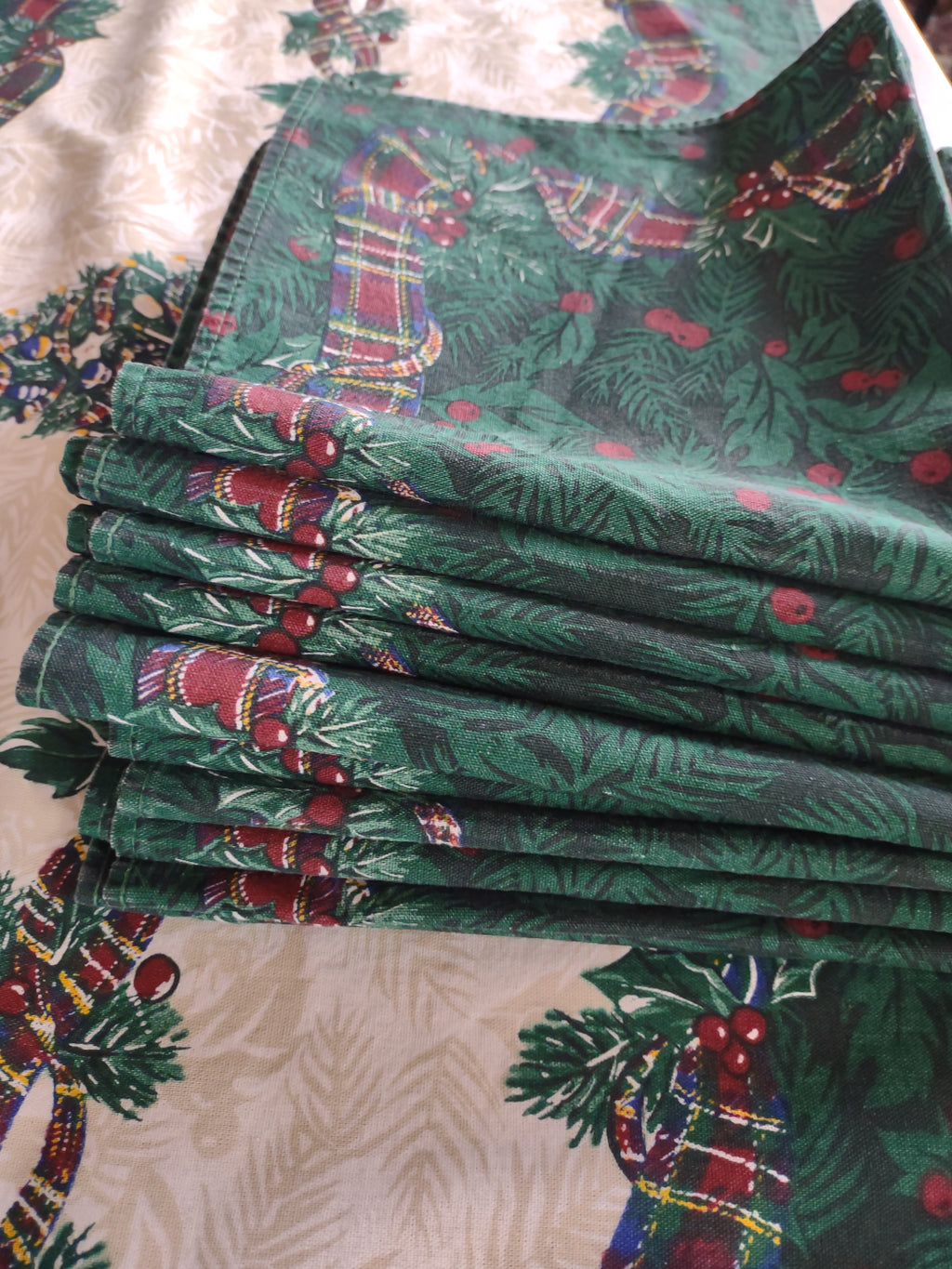 Charter Club Christmas tablecloth with ten green napkins featuring foliage berries and plaid ribbons