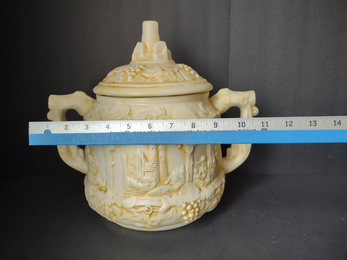 German castles relief punch bowl cookie jar with width ruler