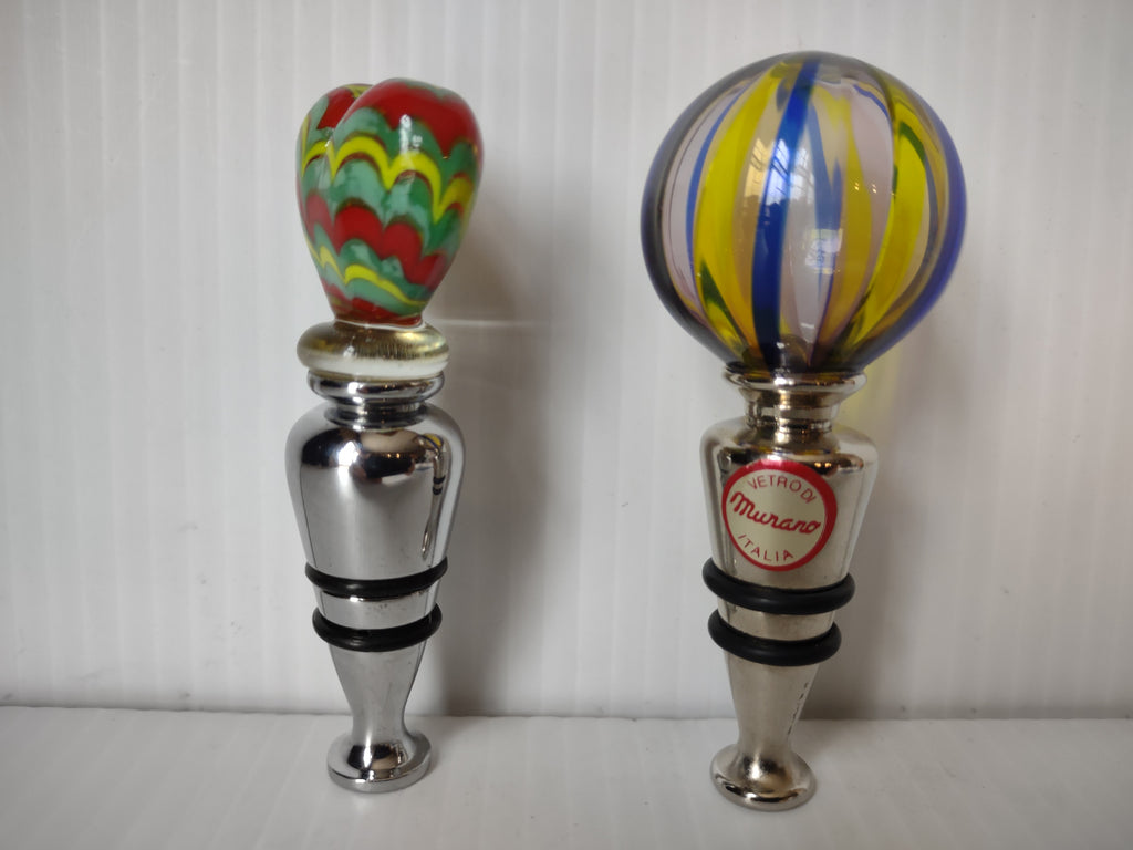 Alternate view of bottle stopper pair showing Murano Italia label on globe stopper