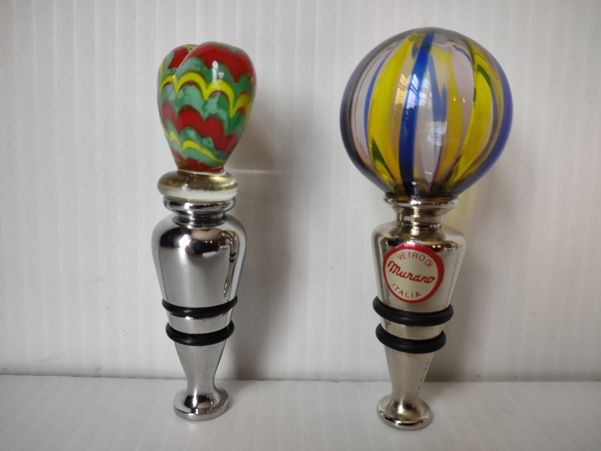 Alternate view of bottle stopper pair showing Murano Italia label on globe stopper