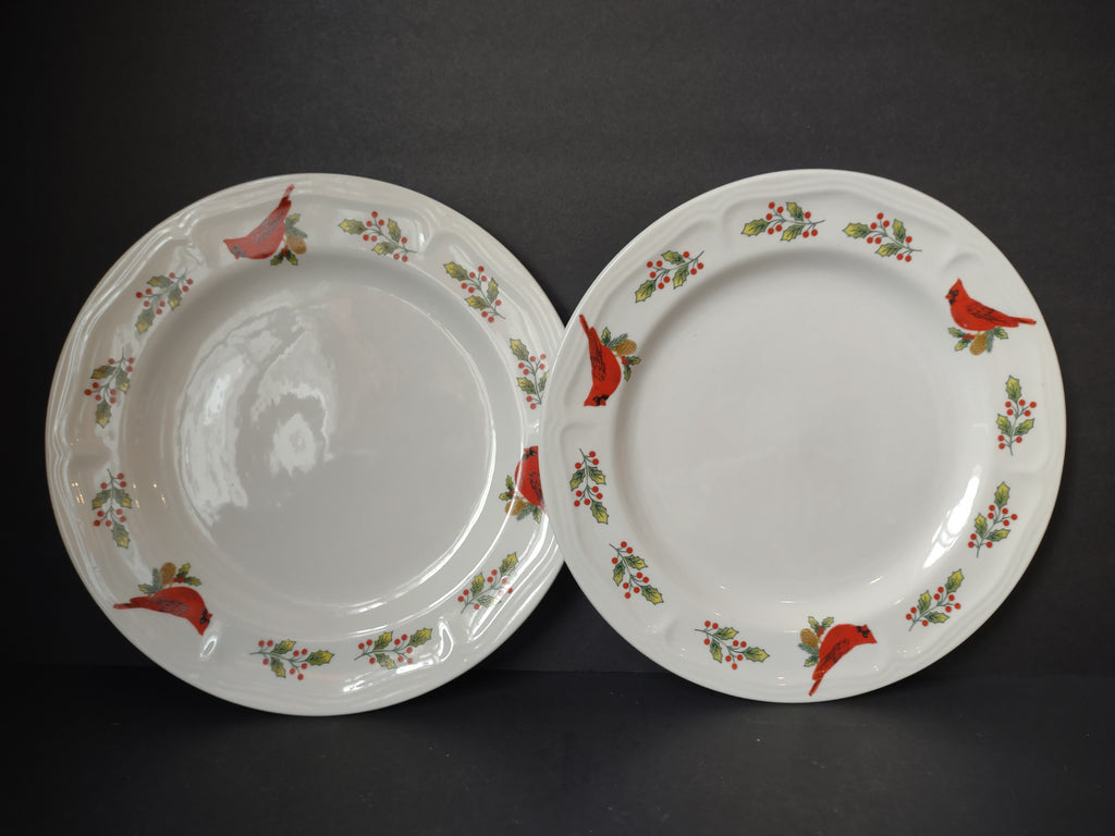 Pair of white Gibson plate pieces decorated with red cardinals and green holly