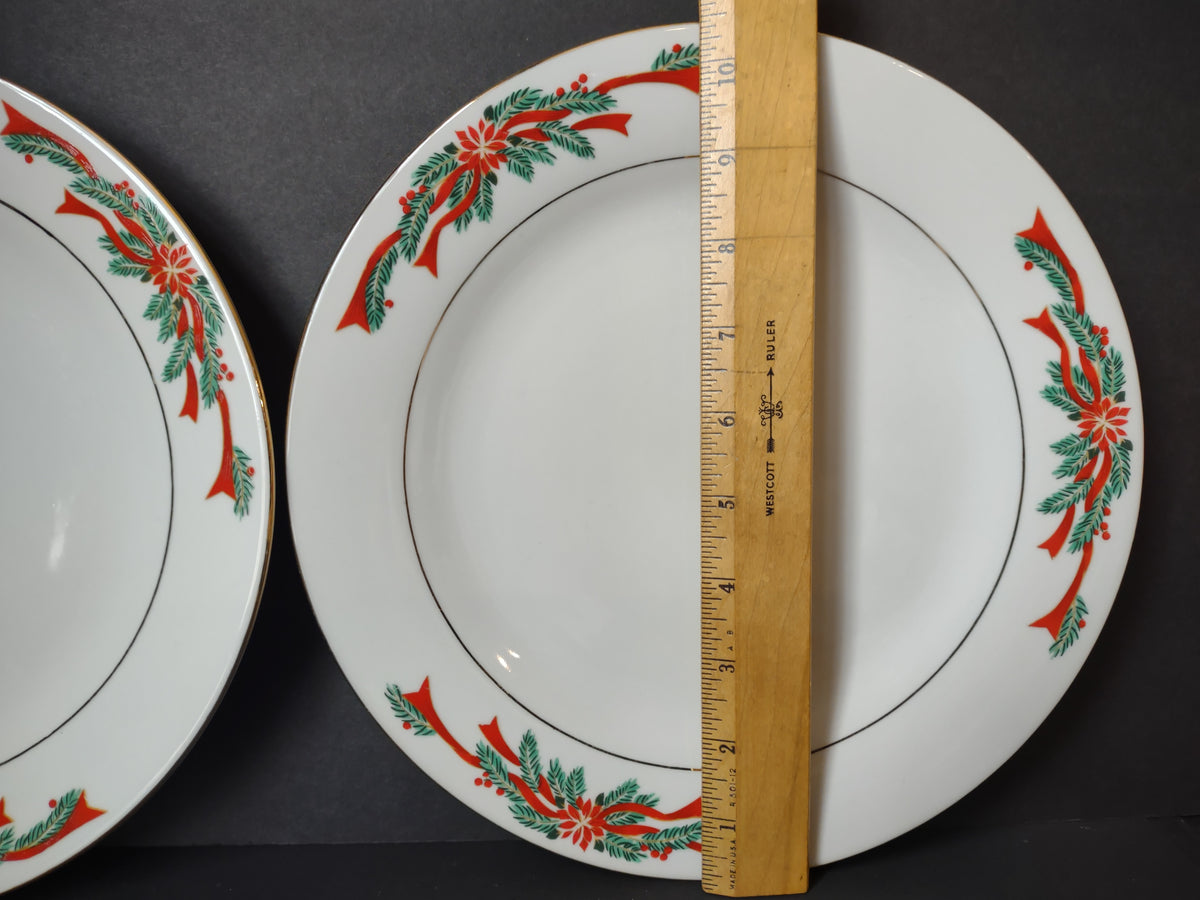 Two Tienshan Poinsettia Ribbon Christmas Plate with red and green decoration