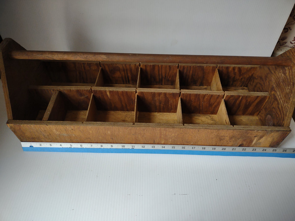 End view of wooden carrier and handle