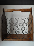 Vintage brown wood and black metal 12 bottle wine rack with top handle