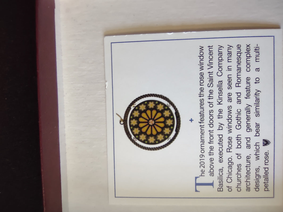 Paper insert describing the 2019 Saint Vincent Basilica rose-window ornament