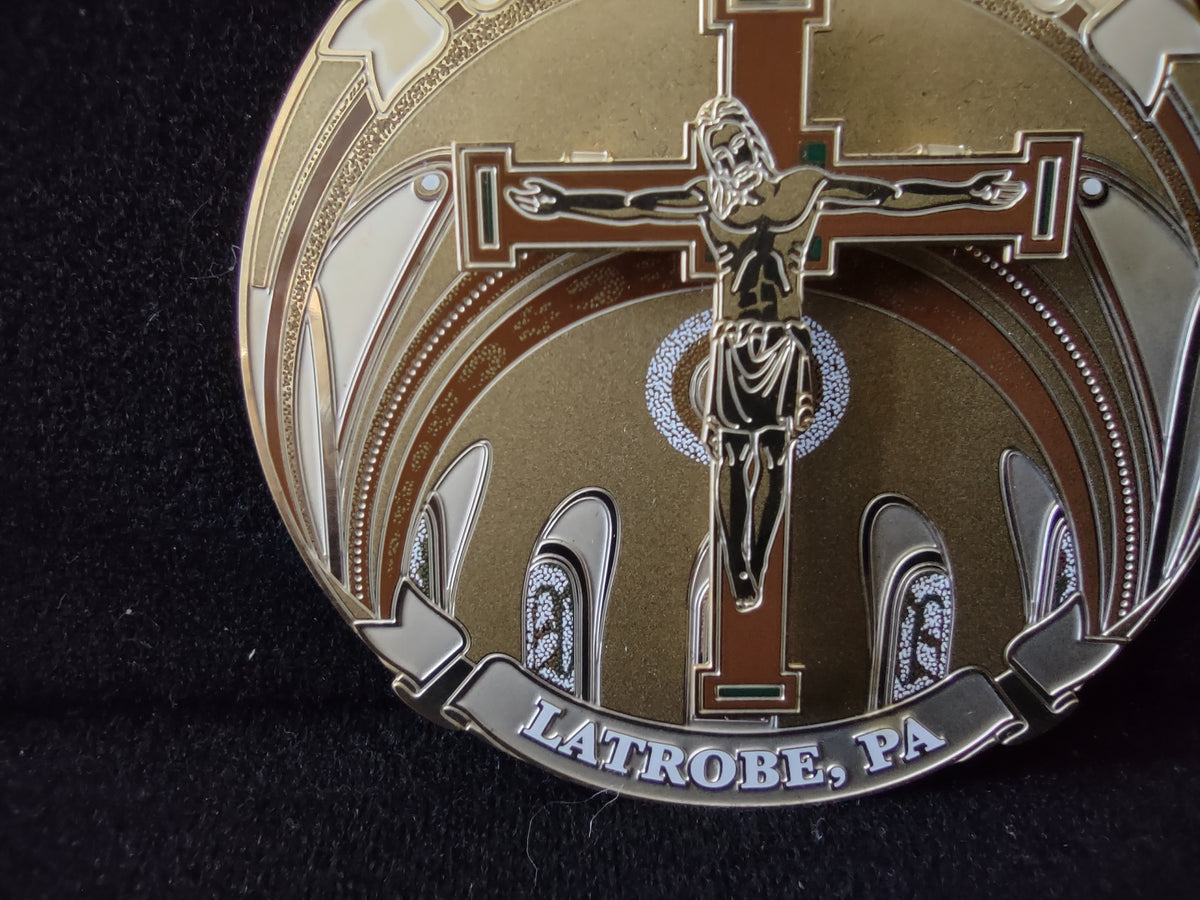 Close-up of crucifix and Latrobe PA inscription