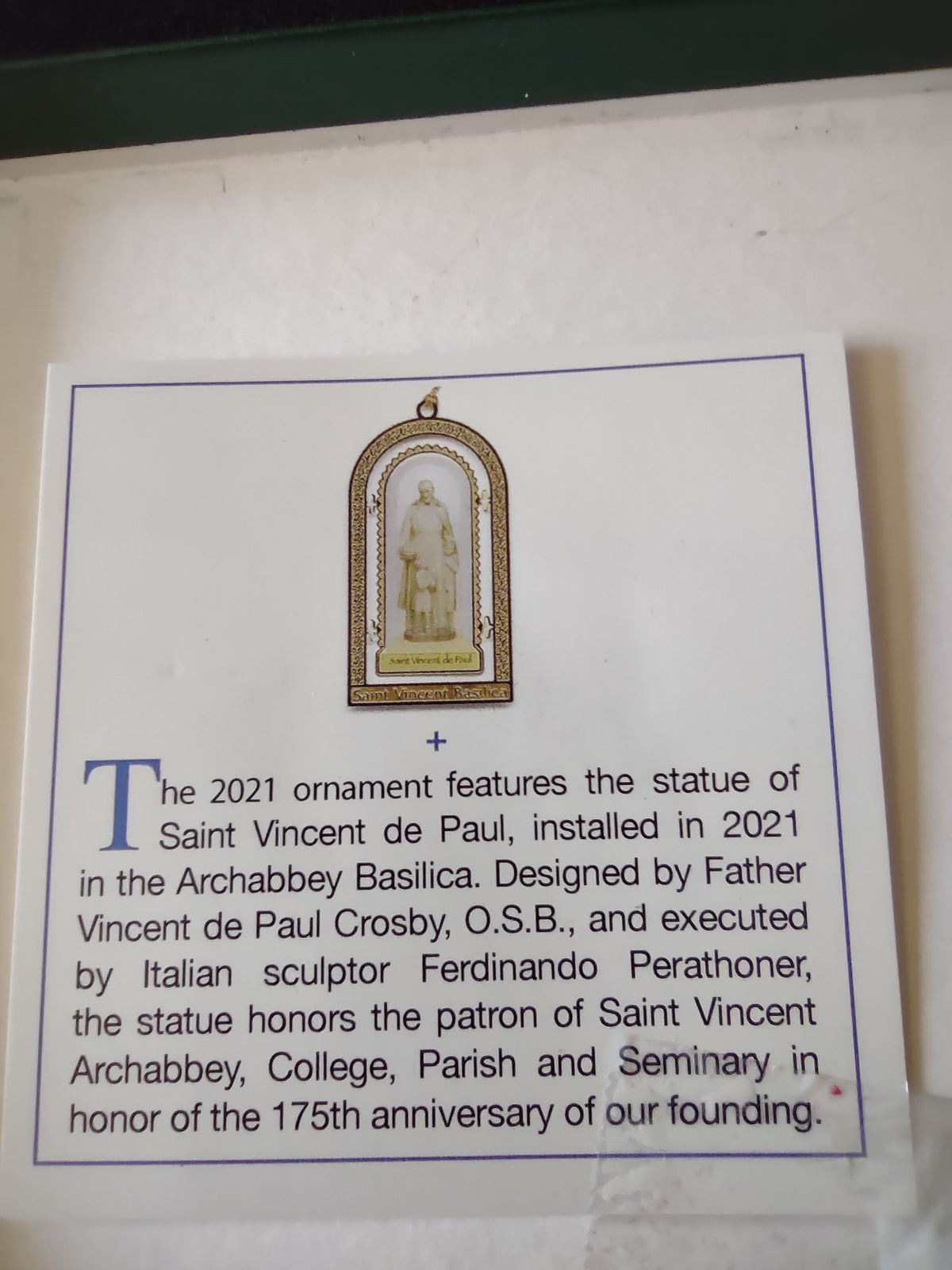 Story card describing the 2021 Saint Vincent de Paul statue ornament