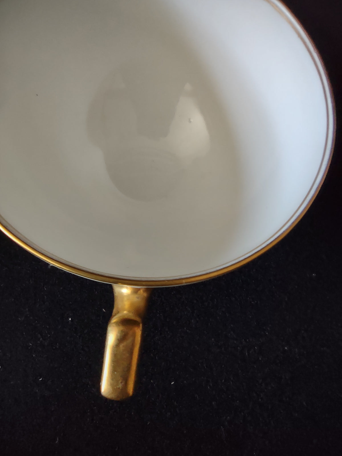 Cup interior and gold handle wear