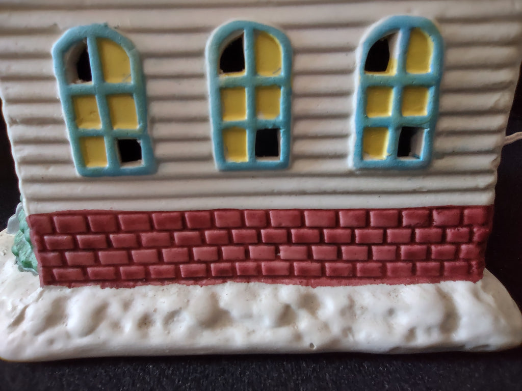 Close-up of snowy roof and chimney
