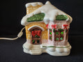 Rear of cottage with corded light assembly
