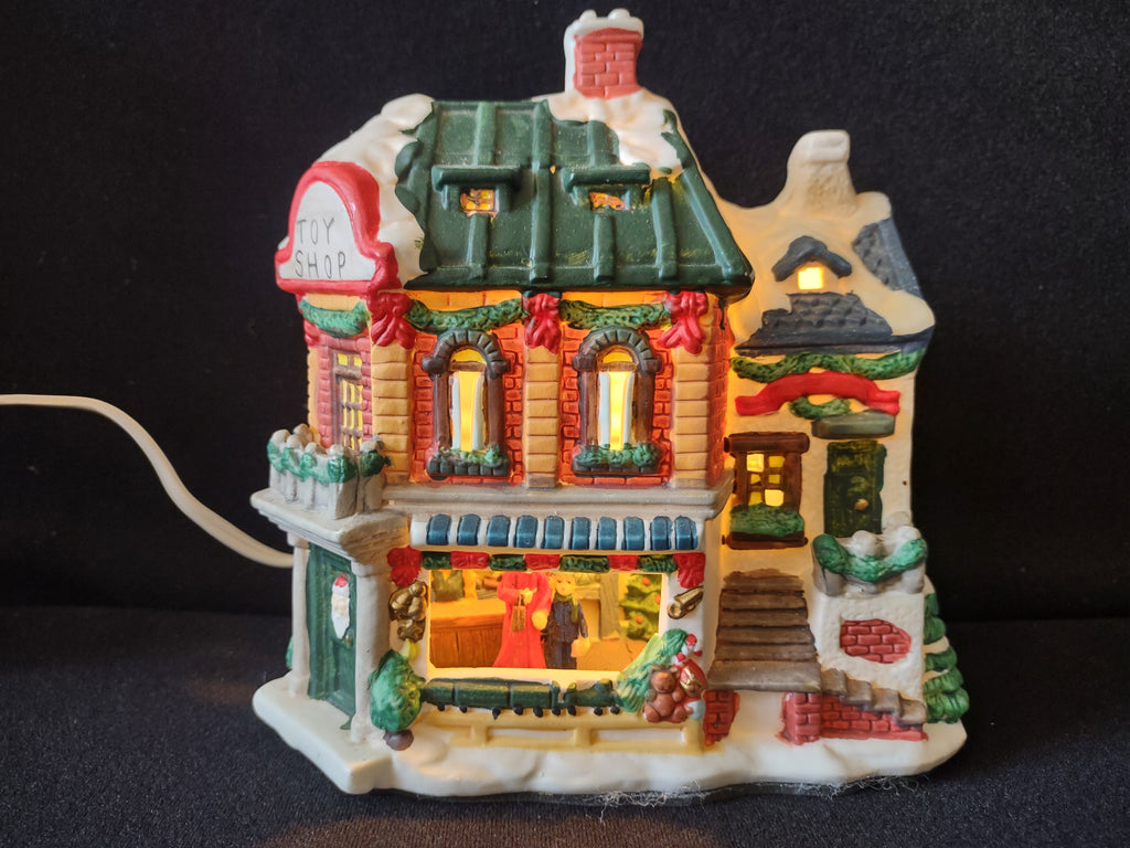 Overhead view of snow-covered toy shop roof