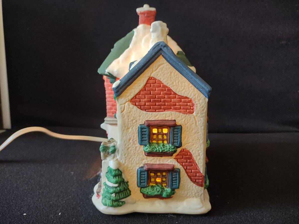 Rear view of village toy shop and light cord