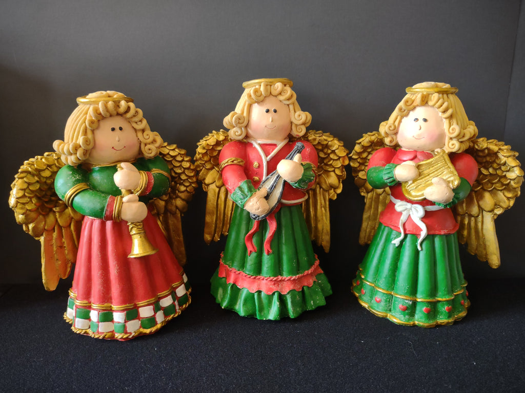 Set of three red green and gold Christmas angel musician figurines
