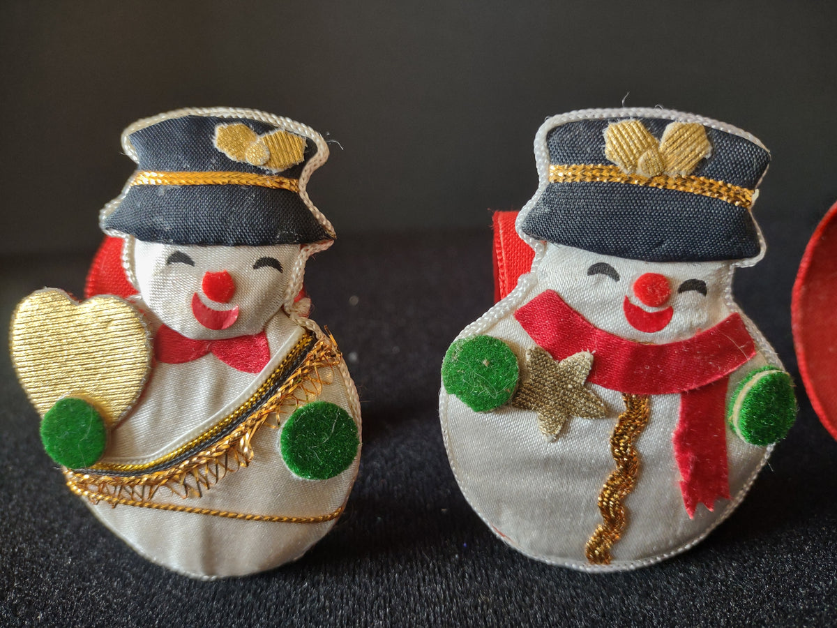 Vintage fabric snowman napkin ring set with red white green and gold details