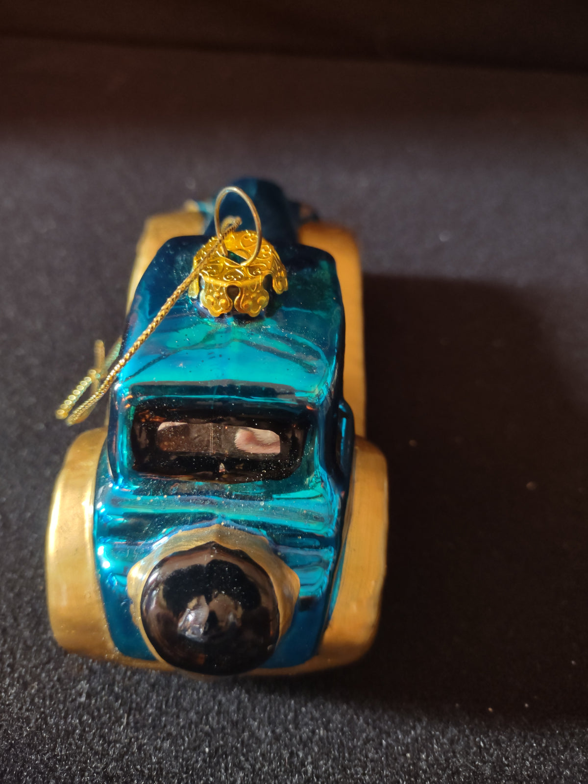 Rear view of car ornament showing spare tire