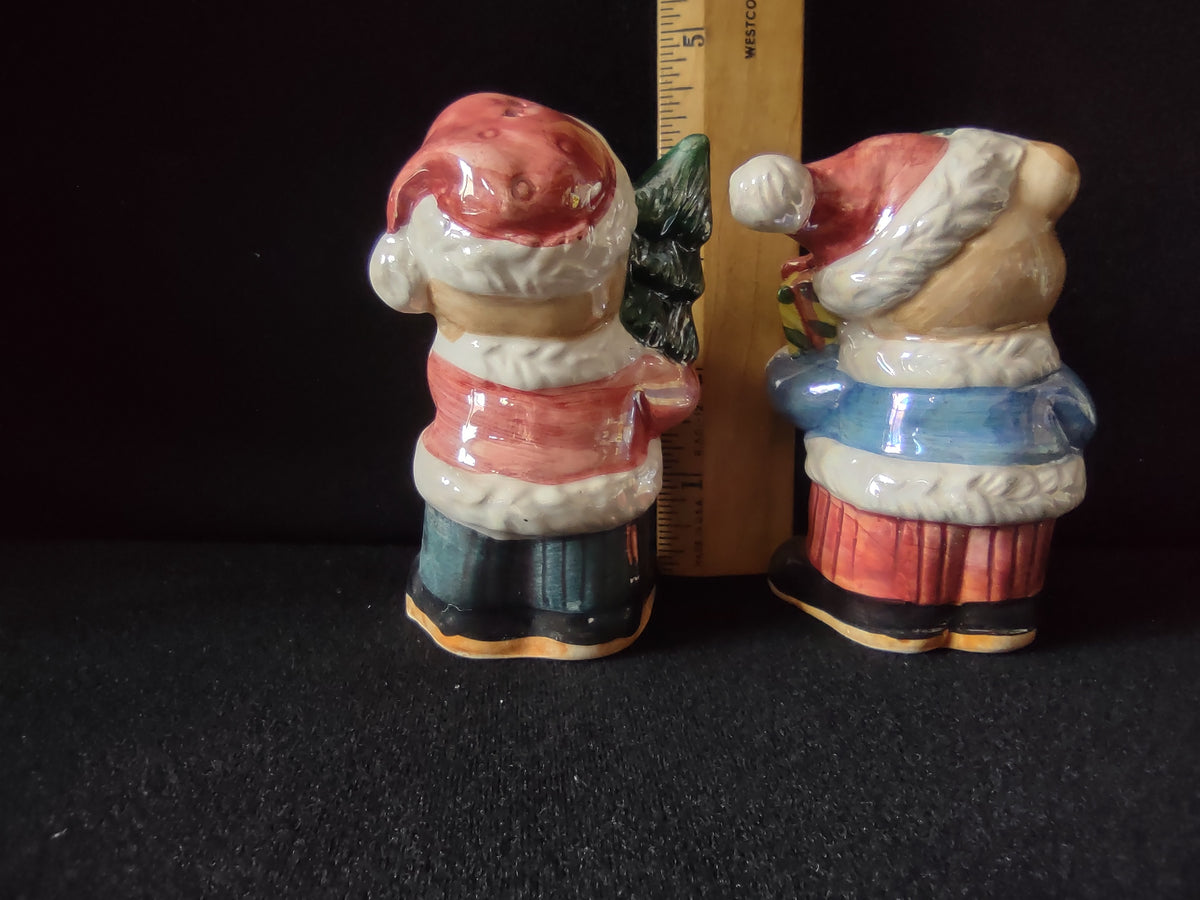 Back view of both bear shakers beside a ruler