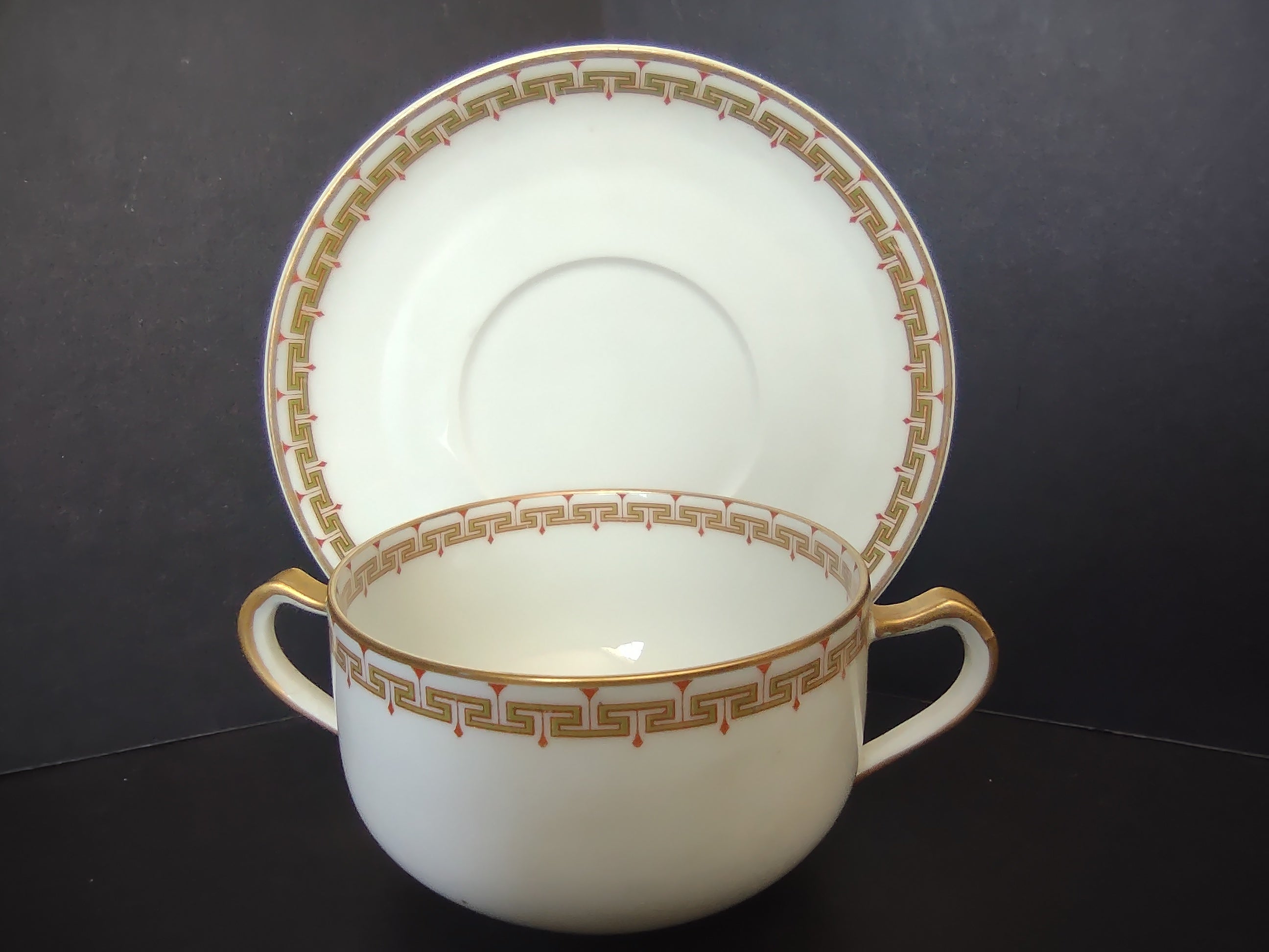 Haviland Limoges Bouillon Cup and Saucer Green Red Design (lot 1063)