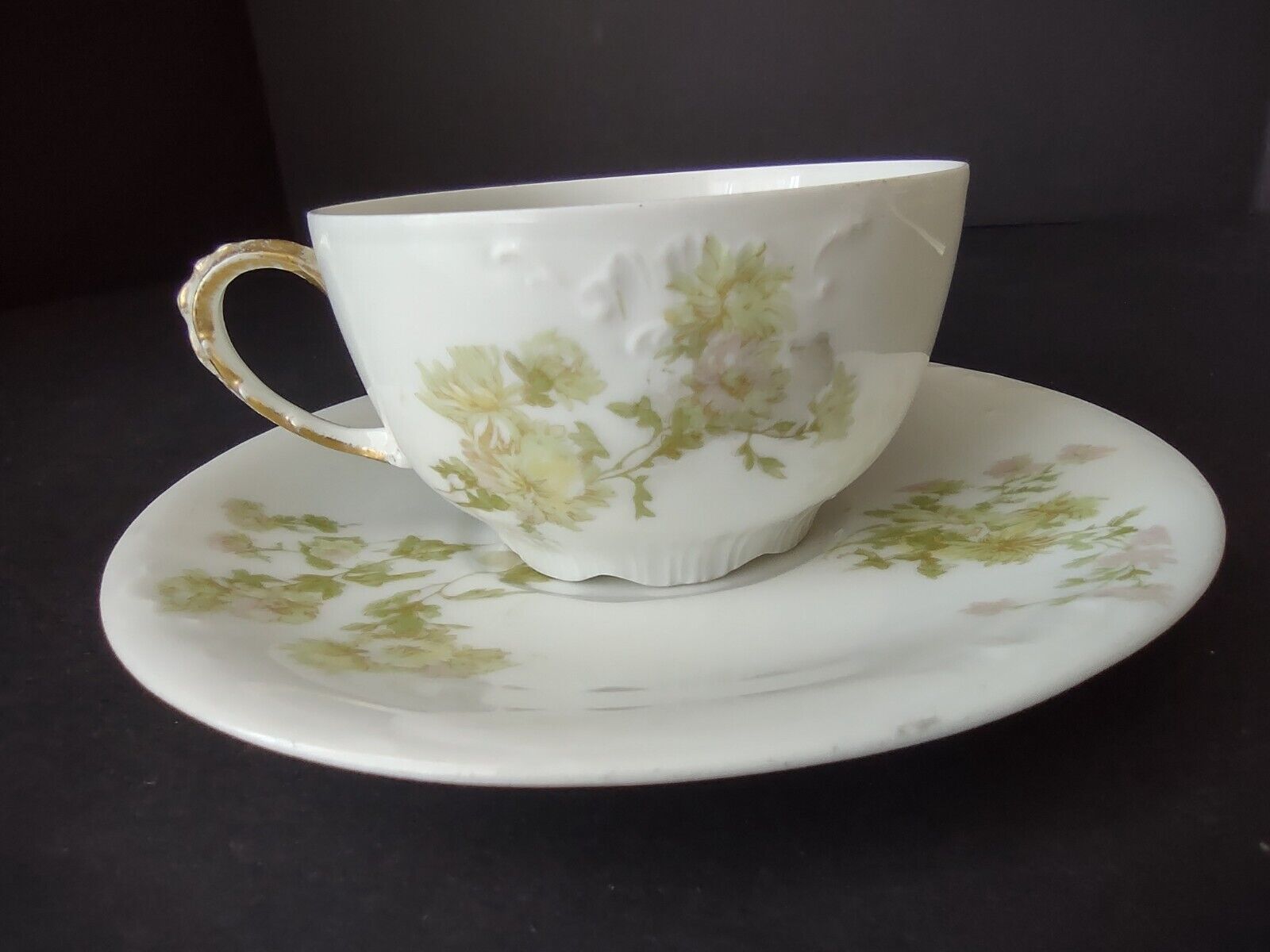 JP Limoges France Porcelain Teacup & Saucer Green Flower Gold Handle (lot 734)