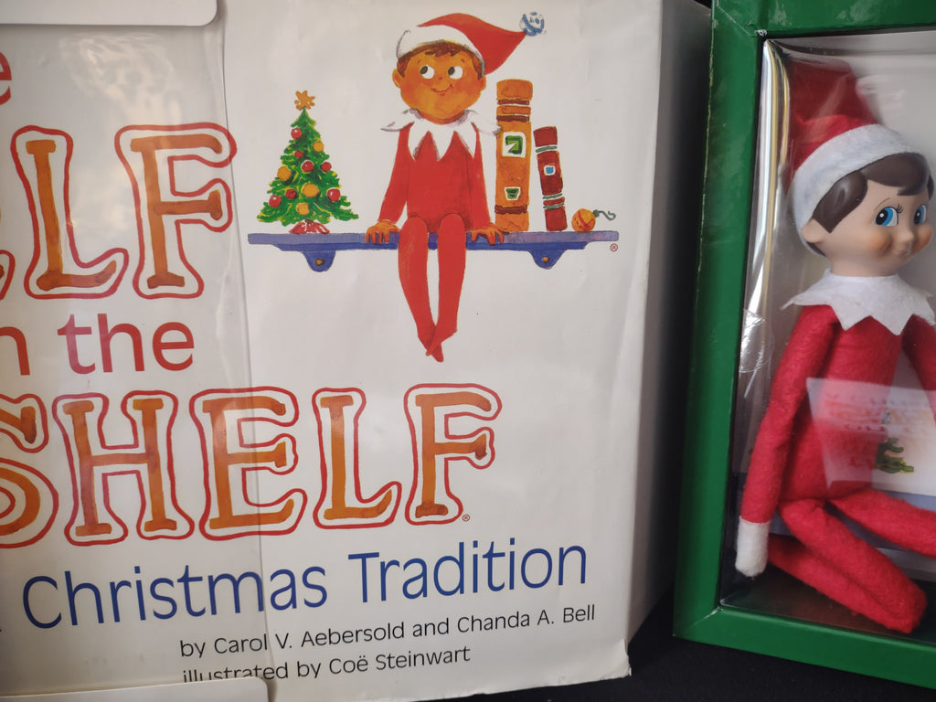 Set Books and Blue Eyes Brown Hair Elf and Naughty Nice Board Game (lot 1724)