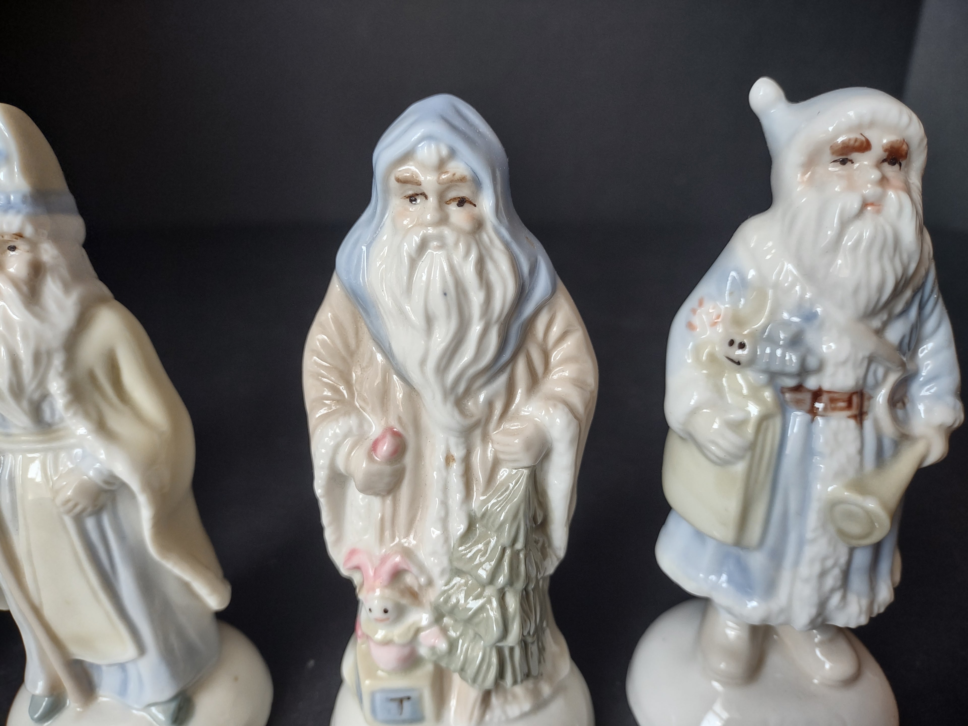 Vintage Set 4 Santa Claus Ceramic Blue White 5" Poland Holland (lot 1208)