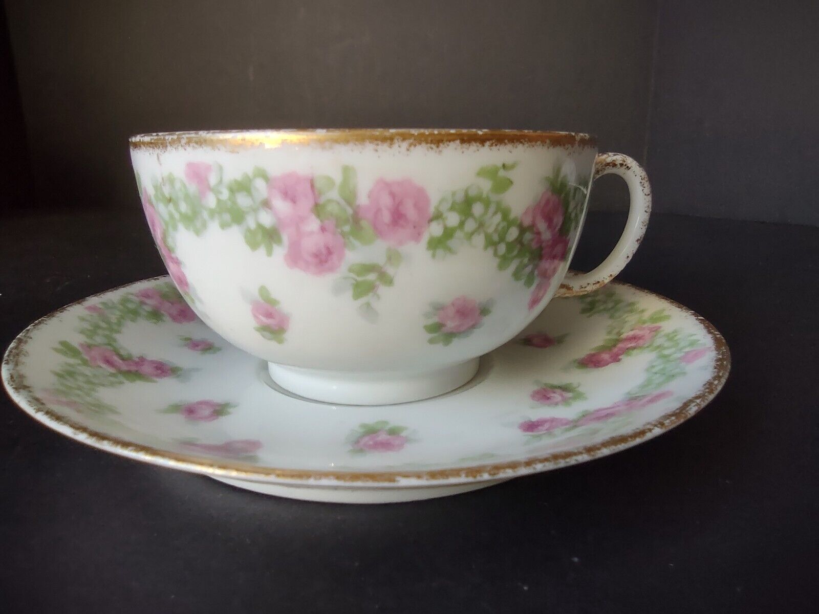 JP France Porcelain for T.G. Evans Tea Cup and Saucer Rose Garland (lot 833)