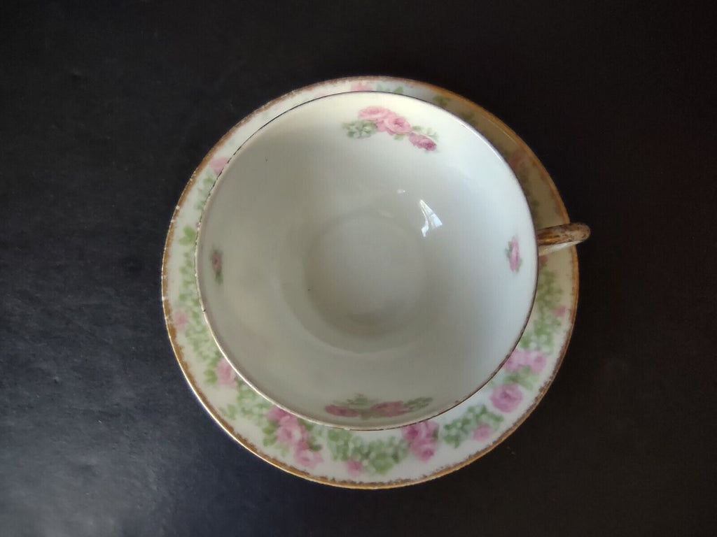 JP France Porcelain for T.G. Evans Tea Cup and Saucer Rose Garland (lot 833)
