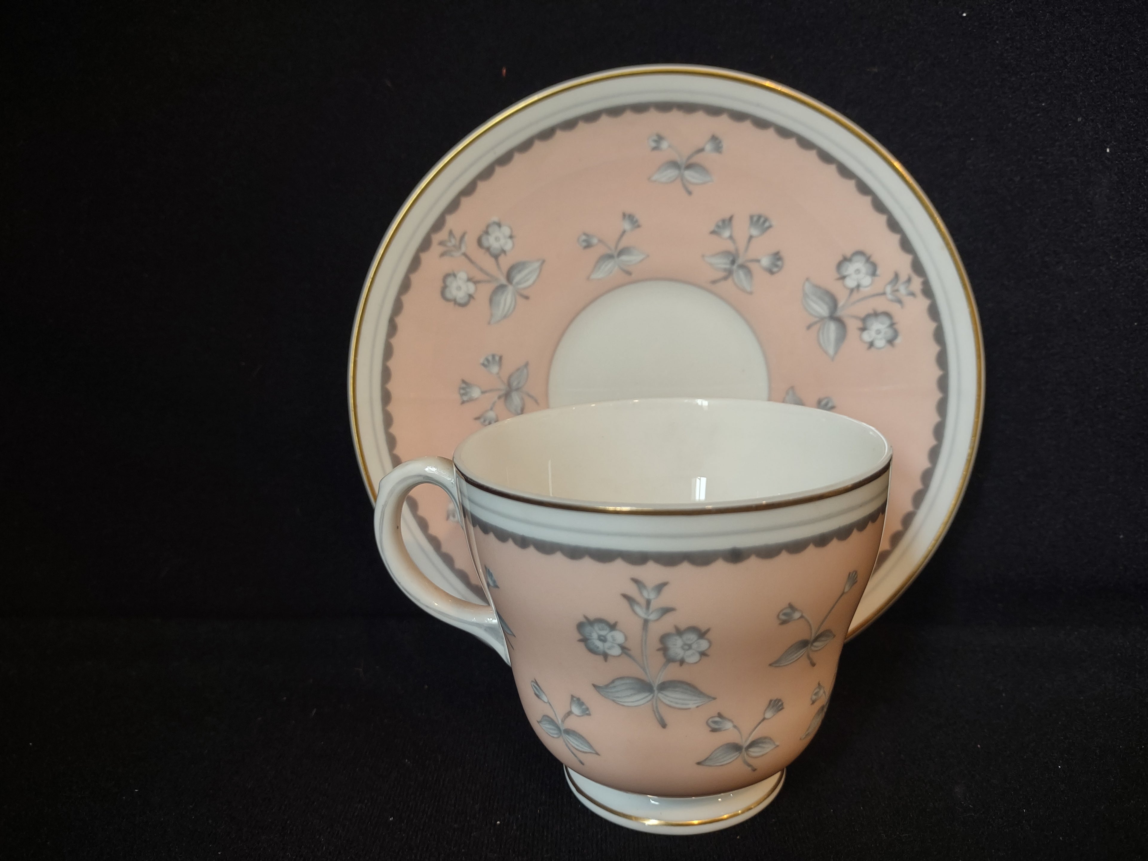 Wedgwood Pimpernel Pink Teacup and Saucer Green Stamp (lot 2765)
